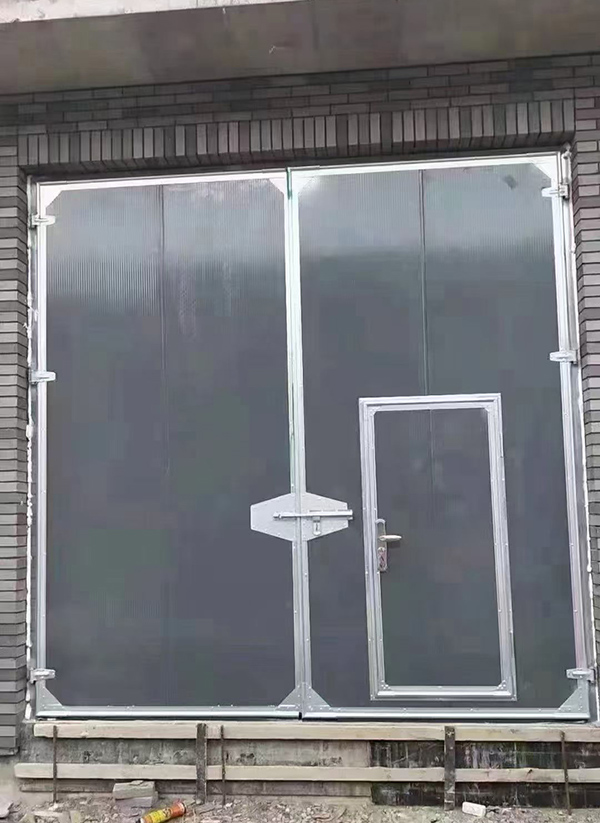 勉县工业平开门在大型设备制造车间的应用实例